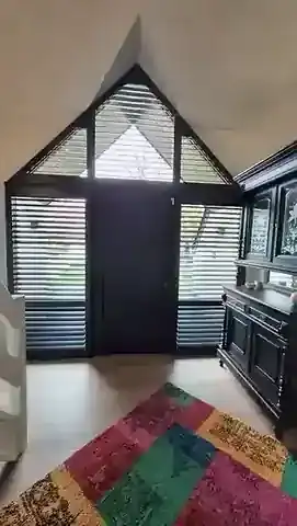 Made-to-measure shutters for an apex window — project photo 4
