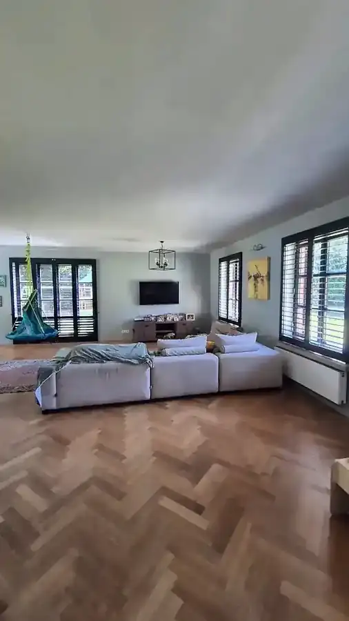 Black shutters in a spacious living room in Oud-Turnhout
